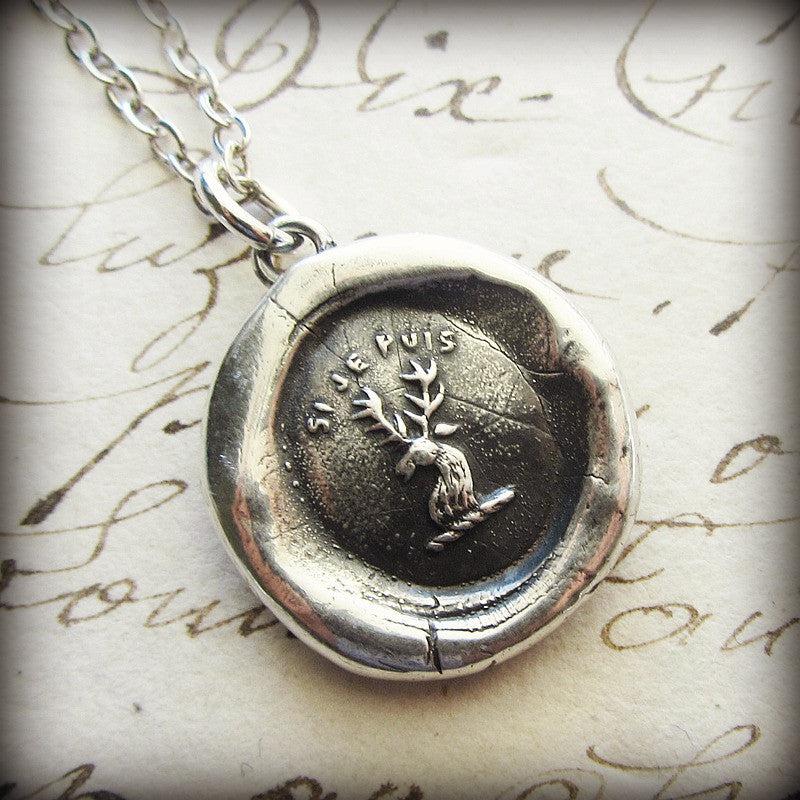 Buck wax seal necklace close