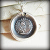 Flower and sun wax seal necklace