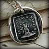 Attached until death wax seal pendant up close