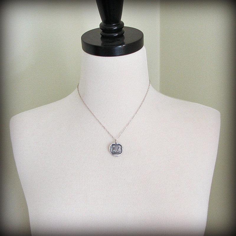 Calm in the Storm wax seal on a mannequin