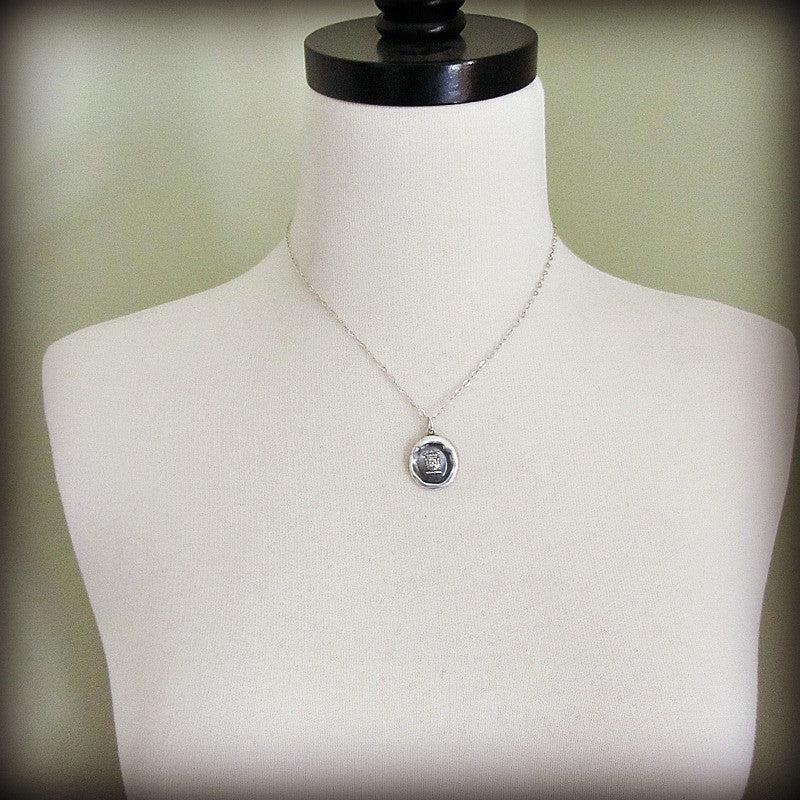 Crown lion wax seal on a mannequin