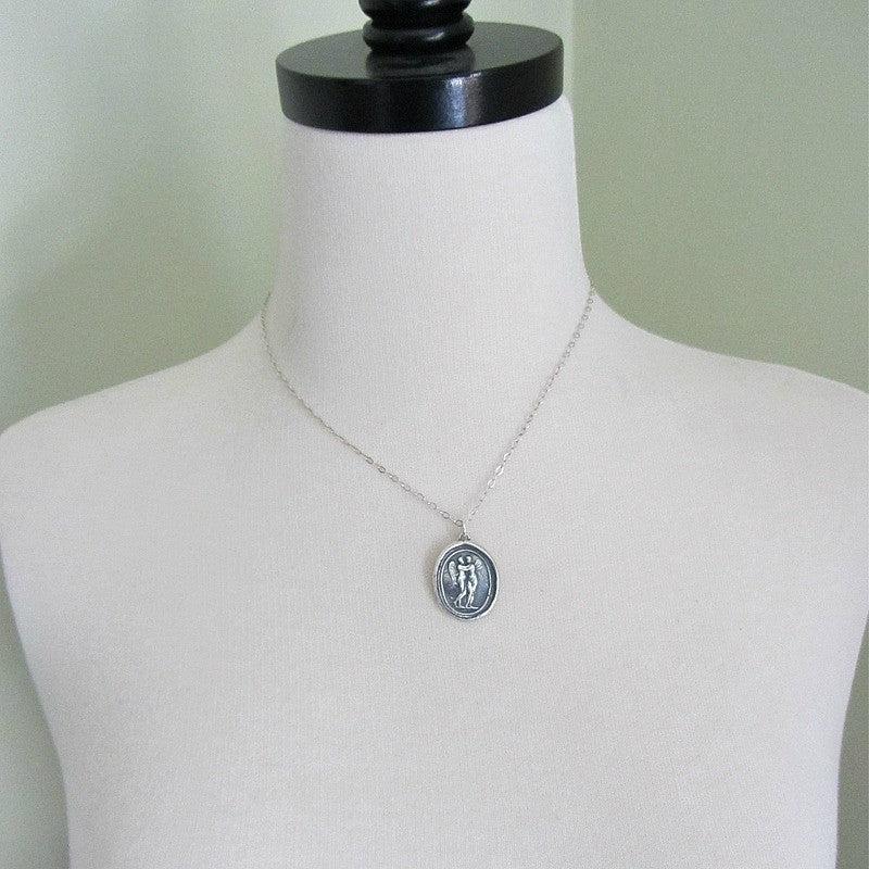 Cupid psyche wax seal necklace on a mannequin