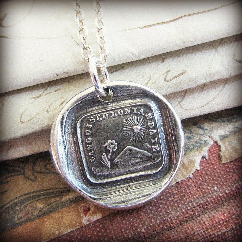 Flower sun wax seal on writing