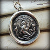 Griffin wax seal necklace close
