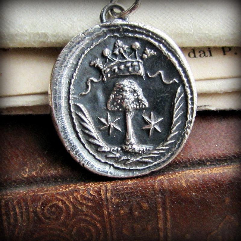 Family tree wax seal necklace close up view
