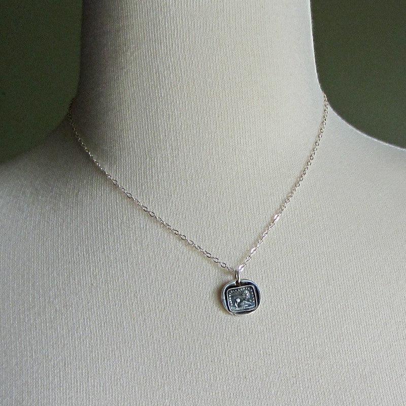 Flower sun wax seal on a mannequin