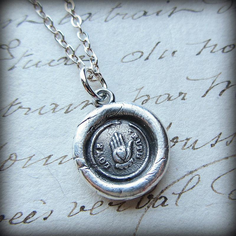 Heart in hand wax seal pendant