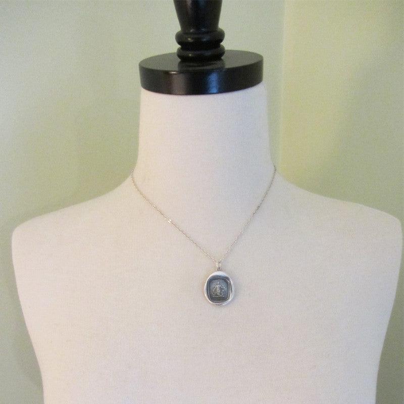 Mermaid Wax Seal Necklace Charm on a mannequin