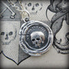 Skull charm wax seal close up shot