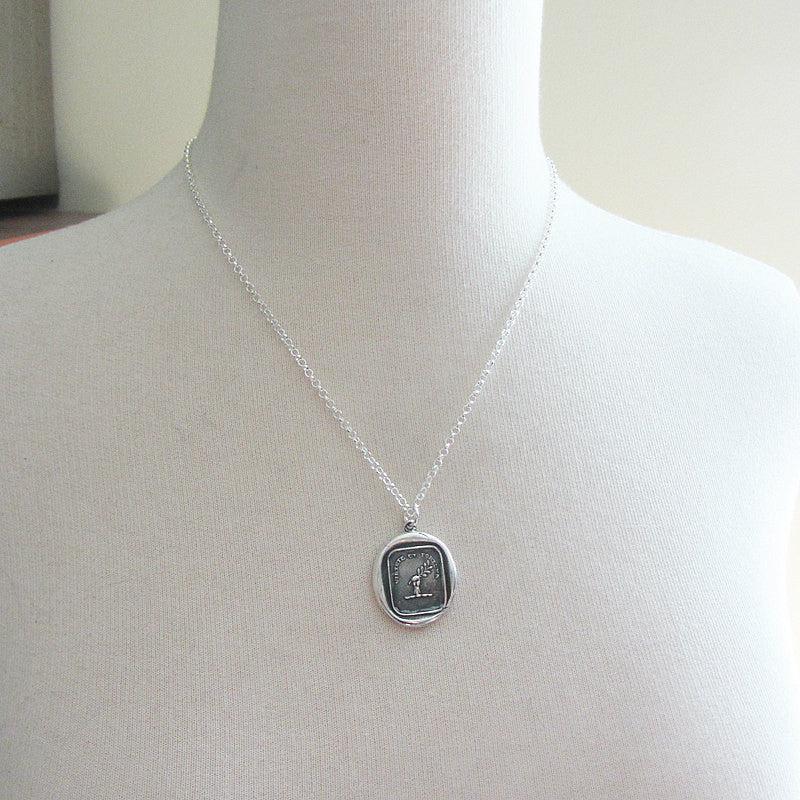 virtue and fortune wax seal on a mannequin