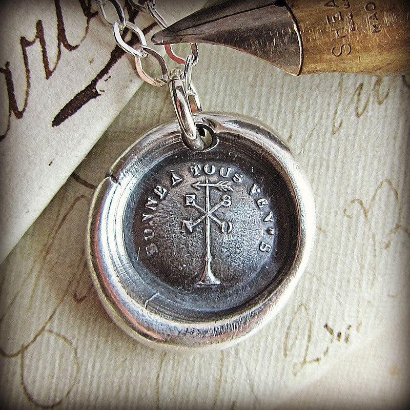 Weather vane wax seal necklace close view