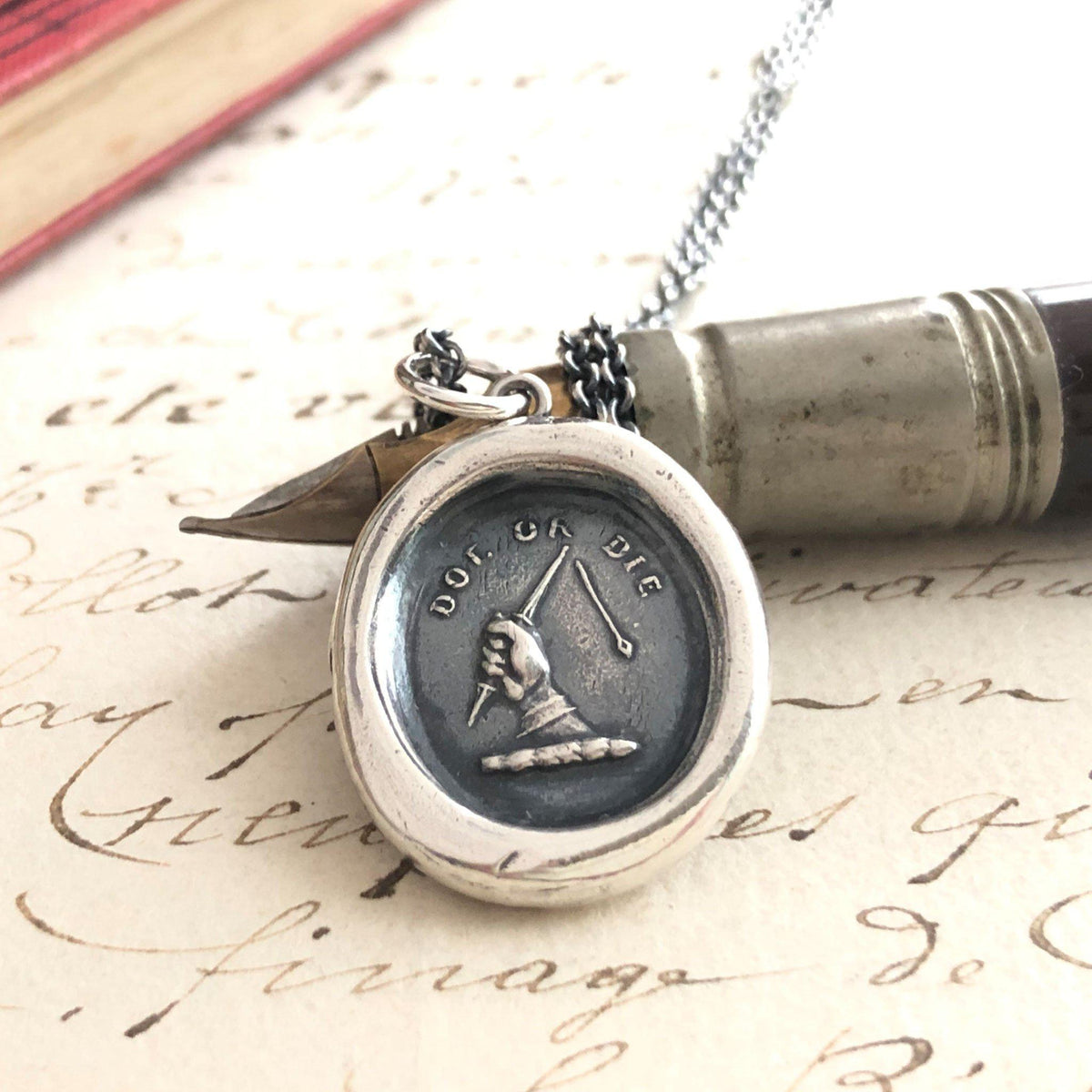 do or die wax seal on a pen