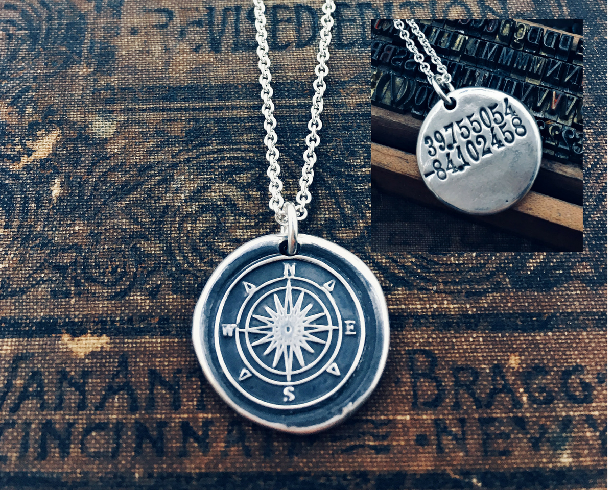 Compass wax seal necklace close up