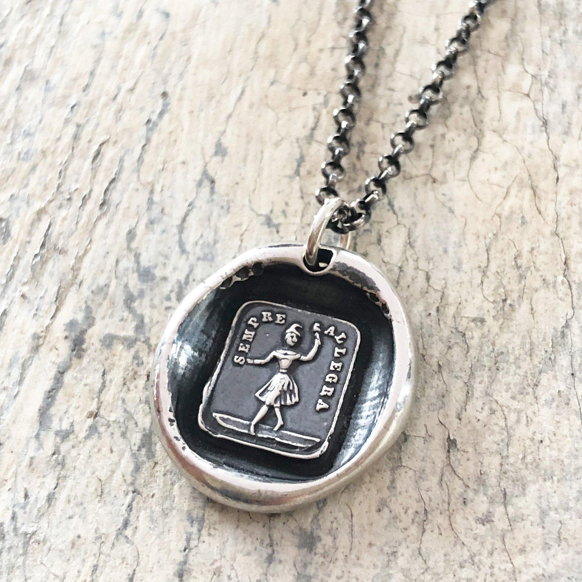 Always glad wax seal necklace with a dark chain