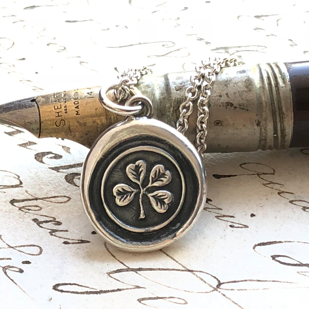 clover wax seal necklace