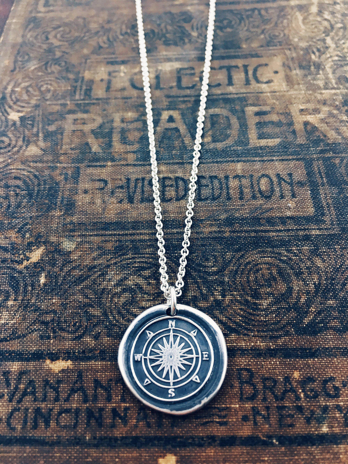 Compass wax seal necklace with a silver chain