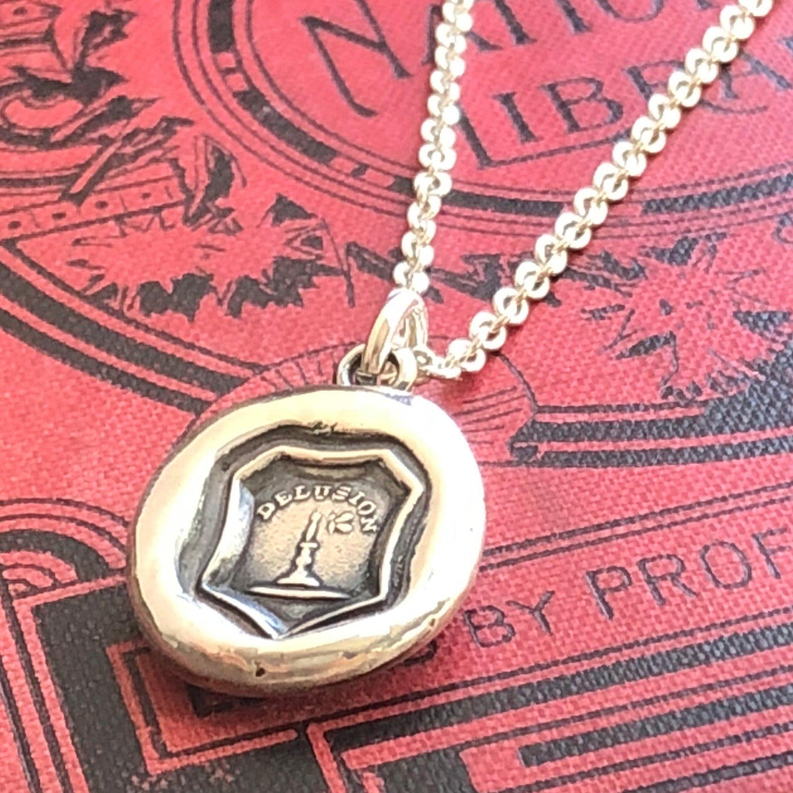 Delusion wax seal necklace