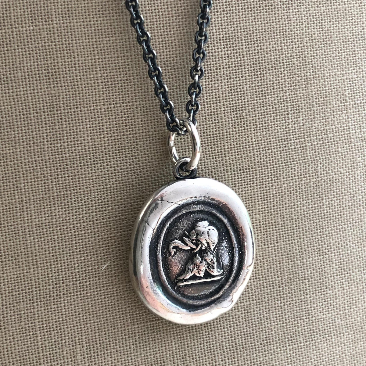 Elephant wax seal necklace with dark chain