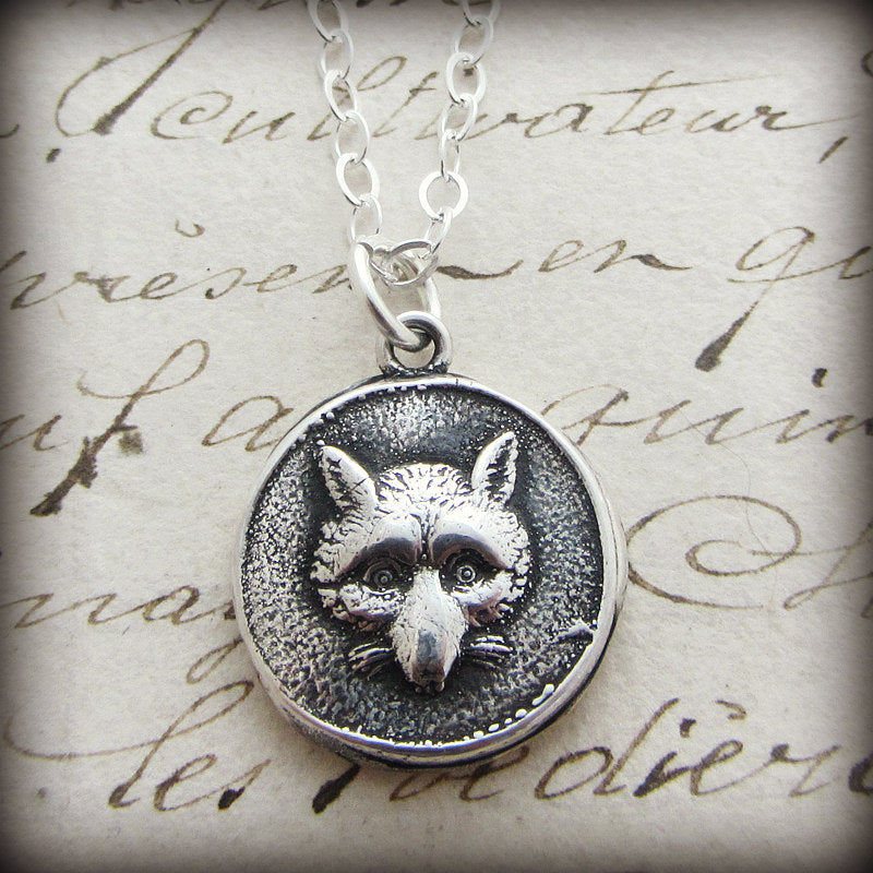 fox face wax seal necklace with a silver chain