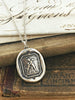 Friendship wax seal necklace with a silver necklace