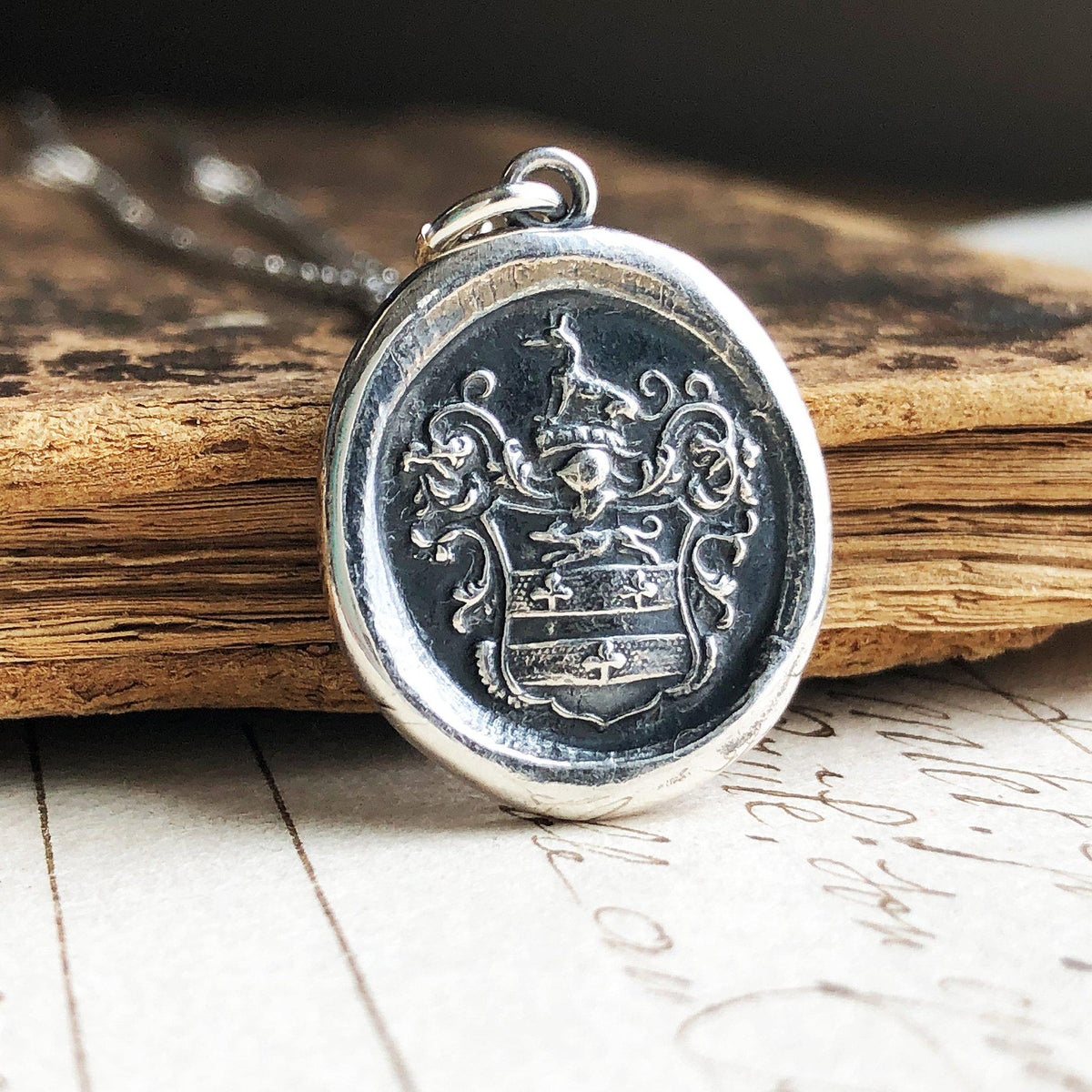 Greyhound crest necklace