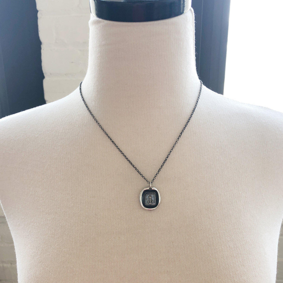 Anchor Necklace with pendant on a mannequin