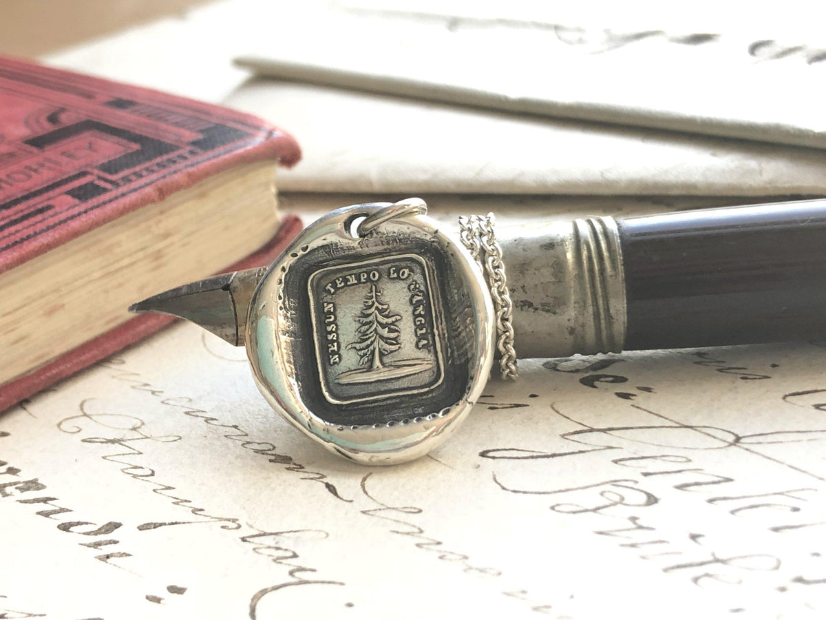 Leaning tree wax seal  on a pen