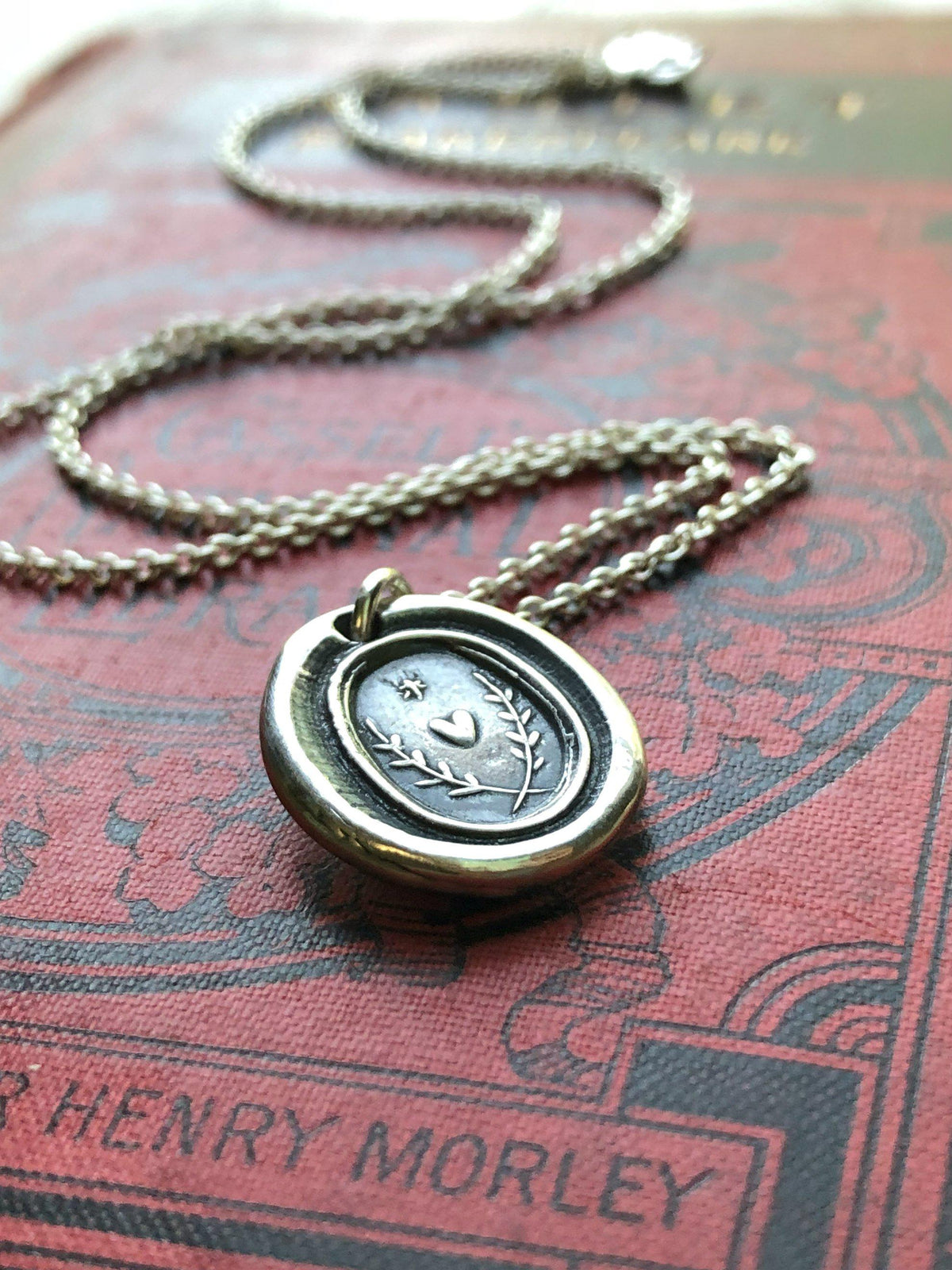 Heart with a star wax seal necklace with gold chain