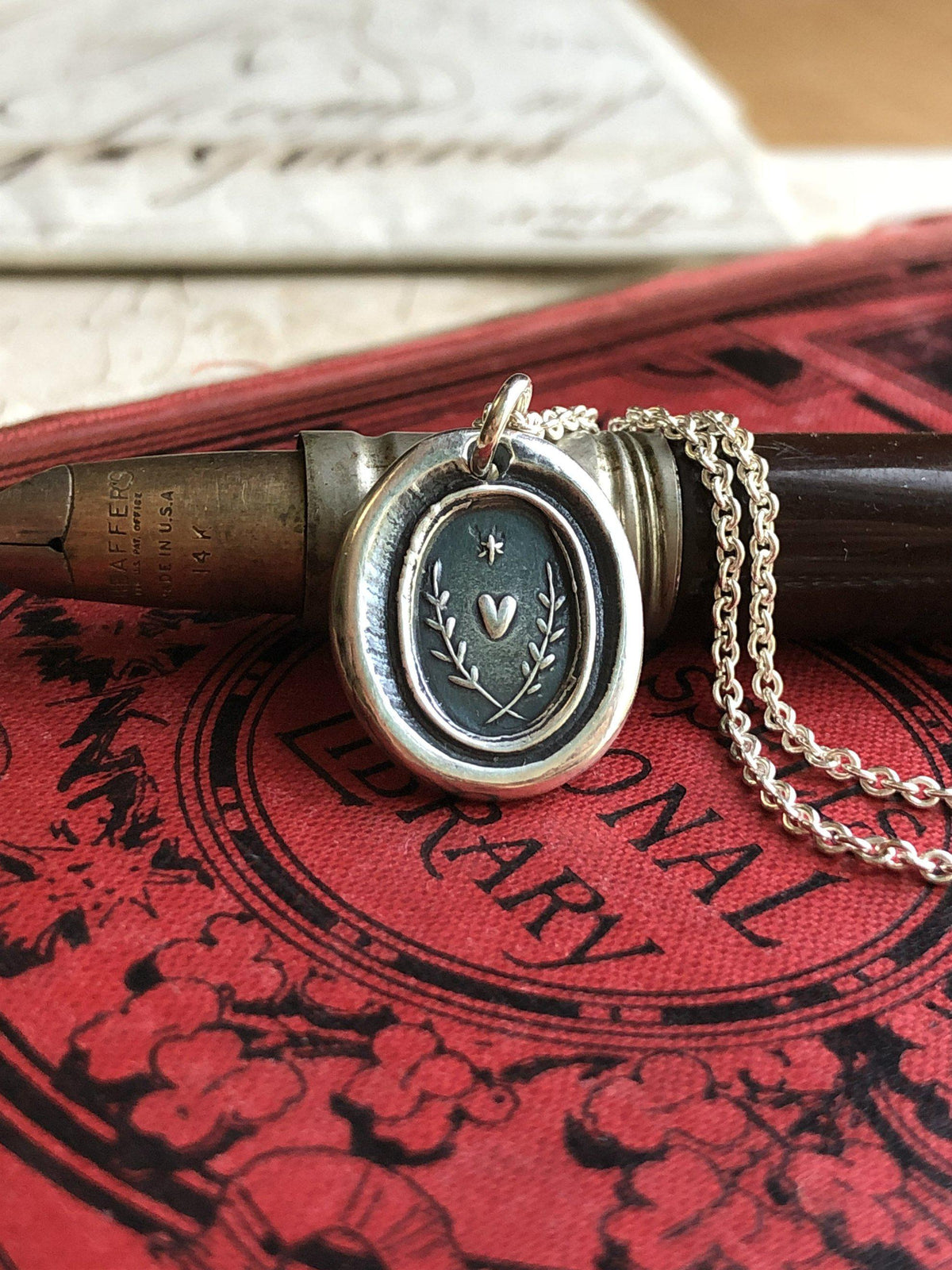 Heart with a star wax seal necklace