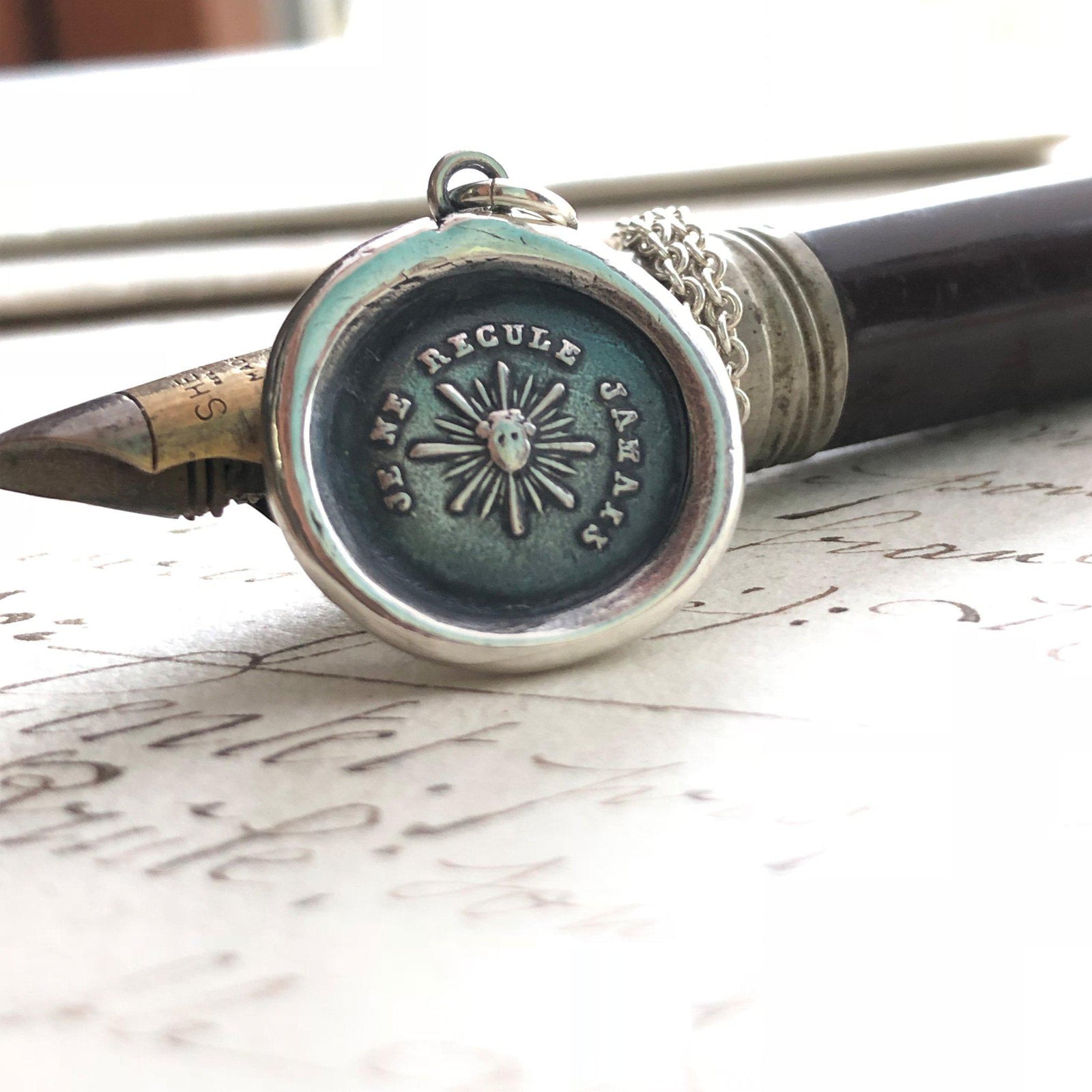 Never back down wax seal necklace