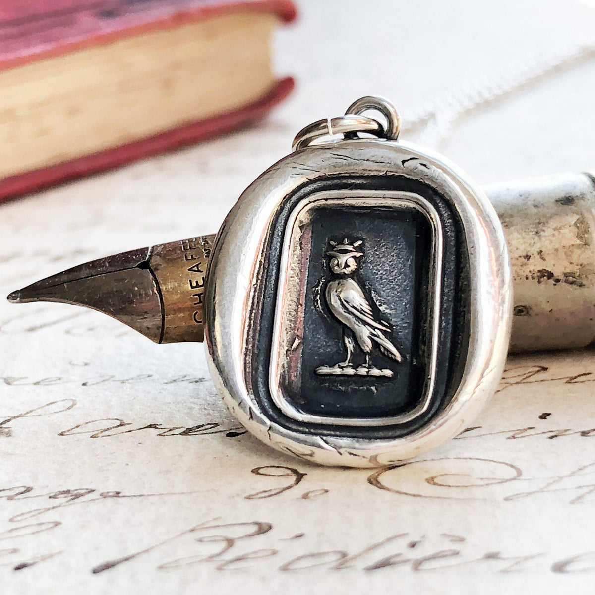 Owl wax seal necklace close