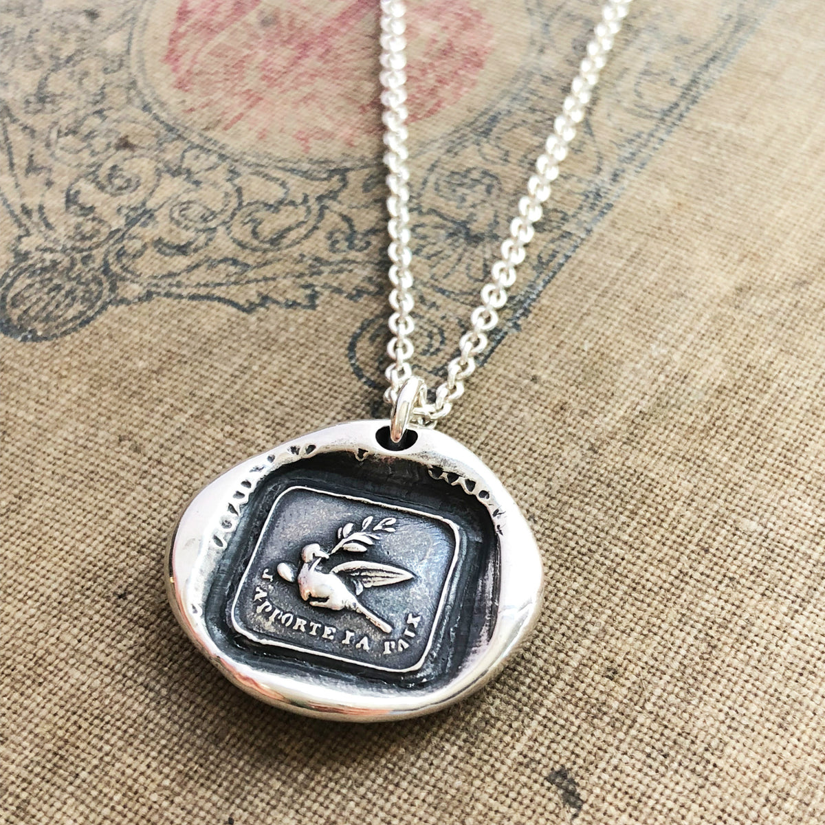Peace dove wax necklace