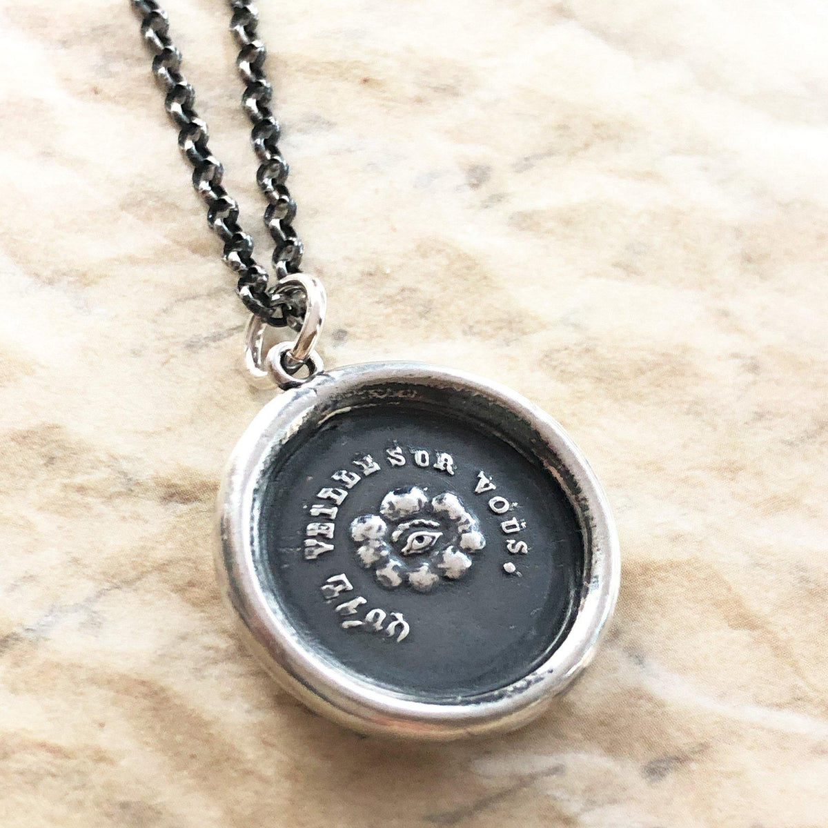 Eye of providence wax seal with a dark chain