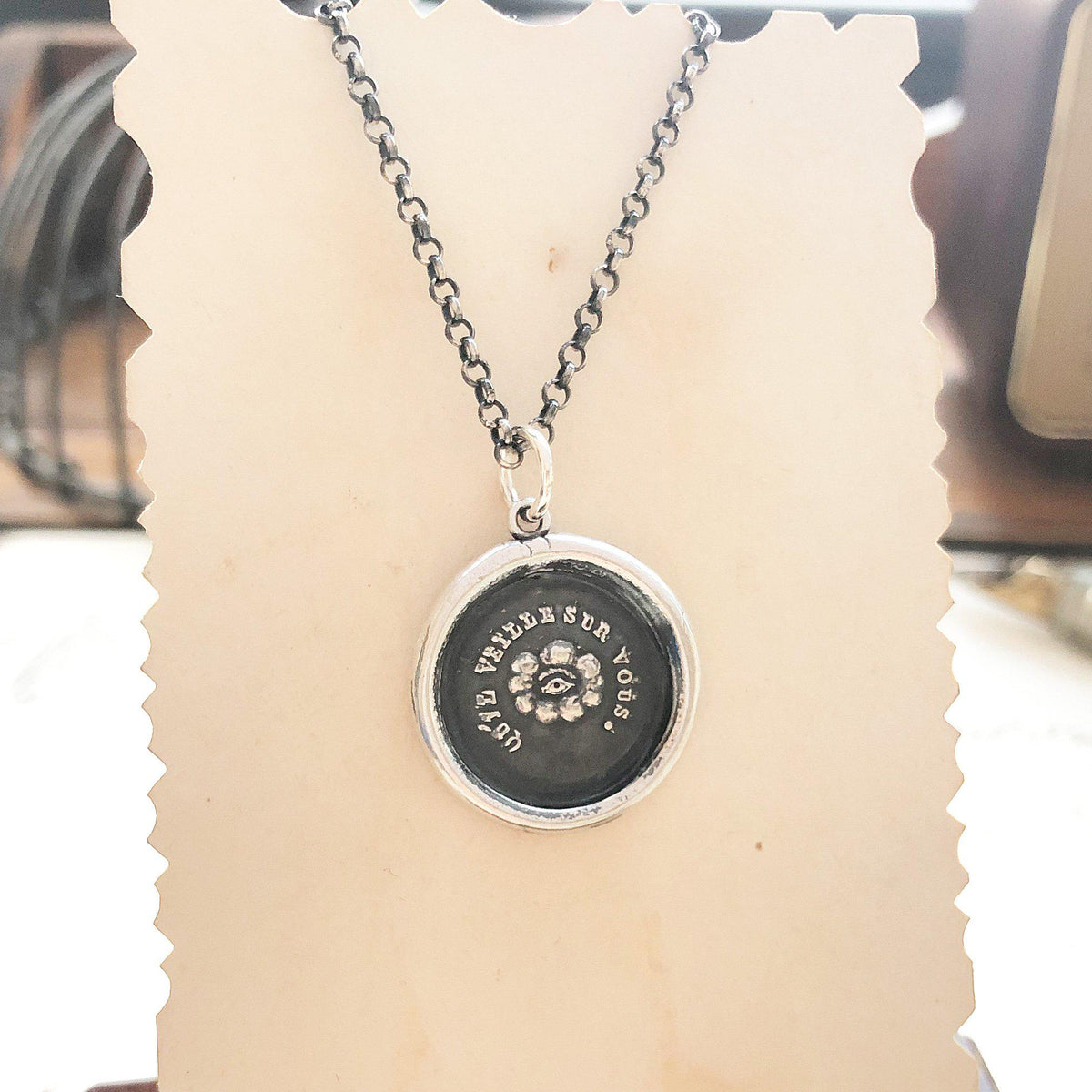 Eye of providence wax seal on a piece of paper