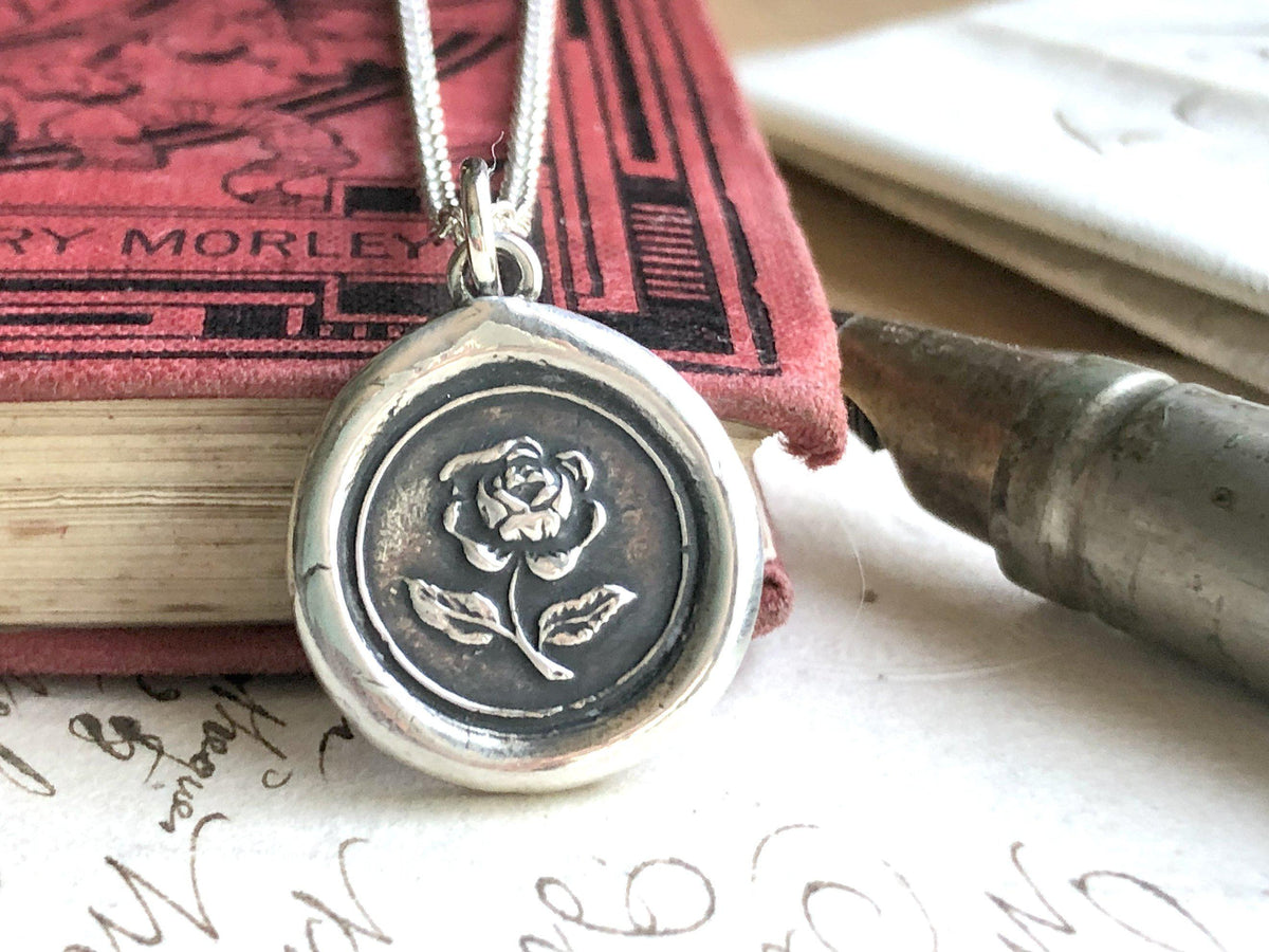 Rose wax seal necklace close up 