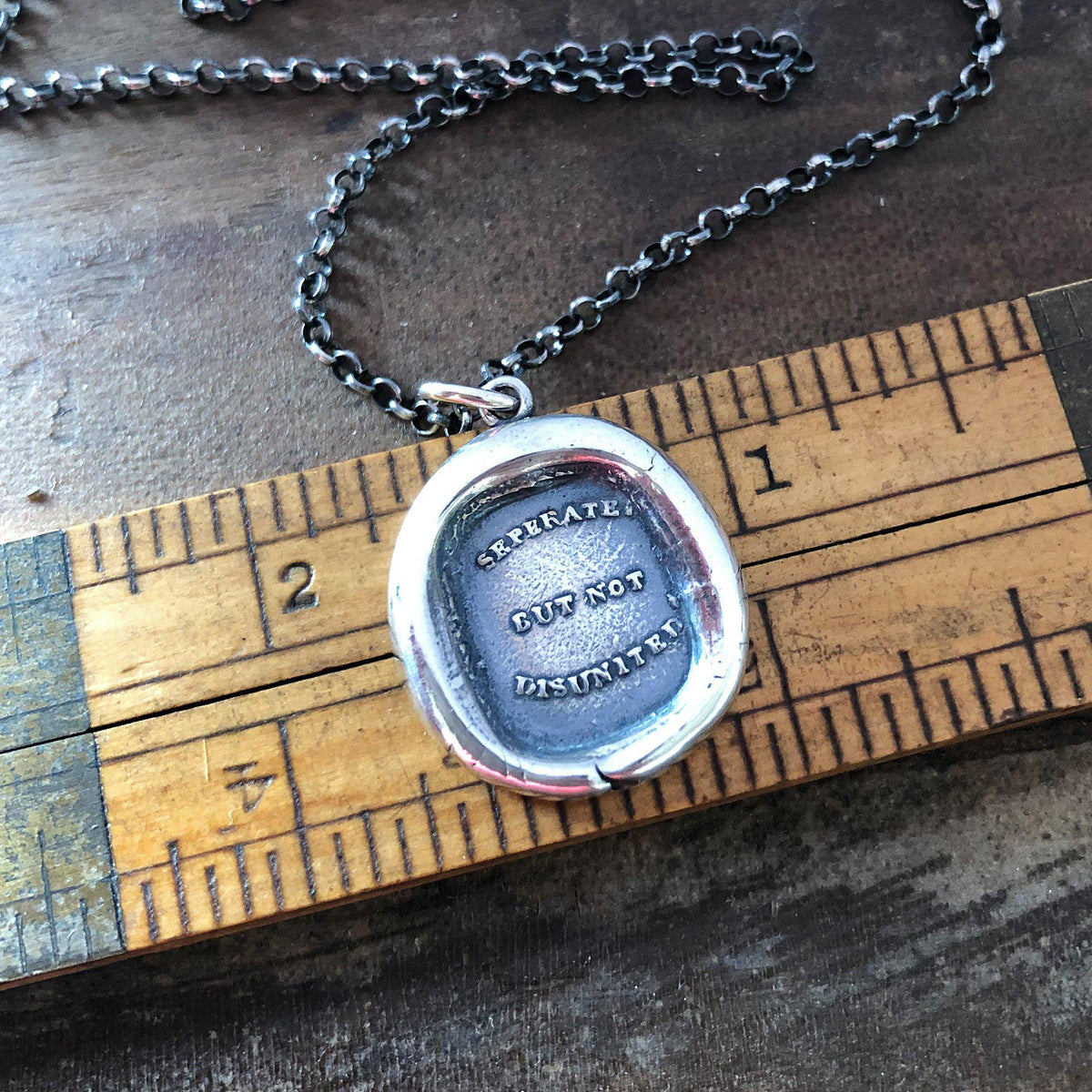 Separate but not on a pen on a ruler