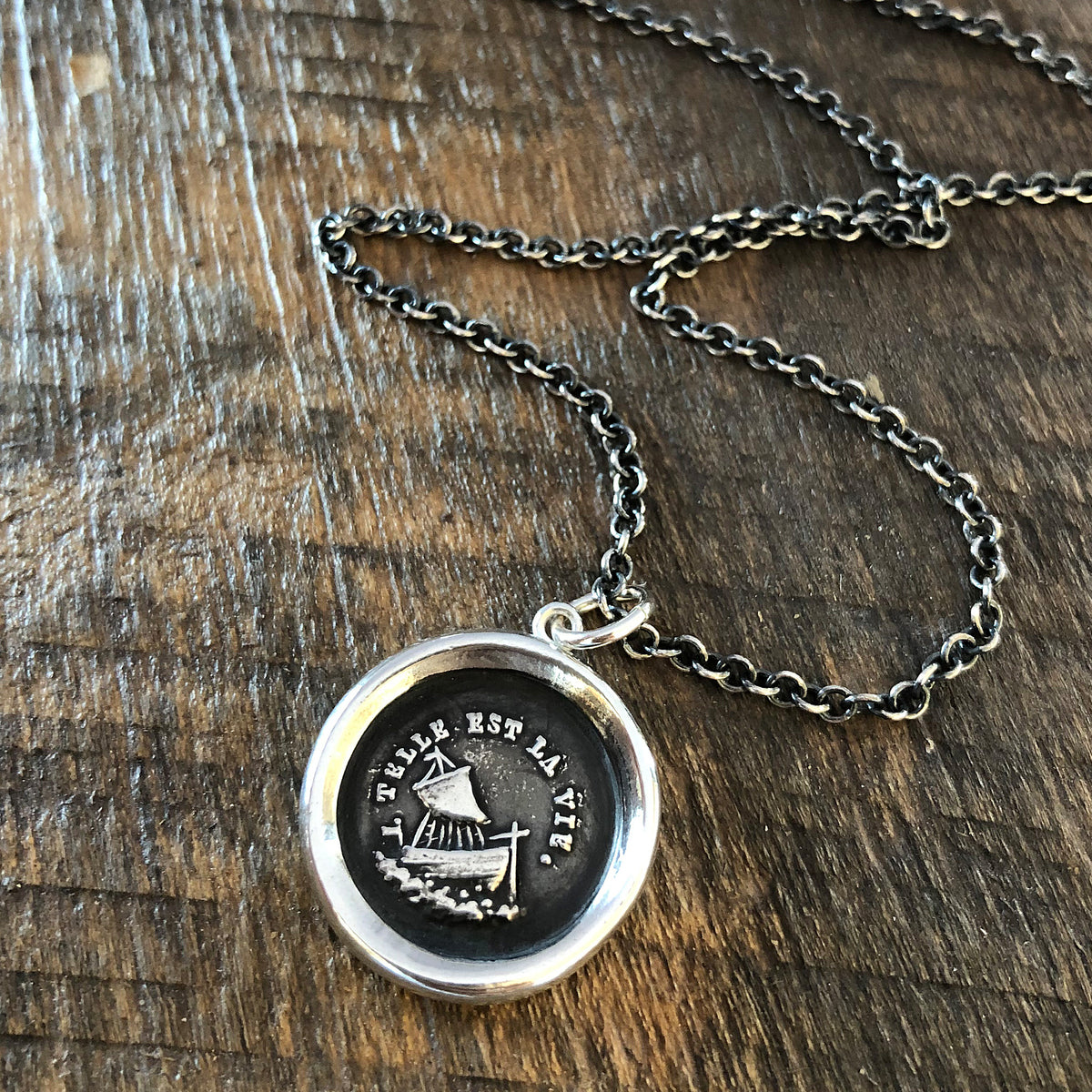 Such is life wax seal necklace with a dark chain