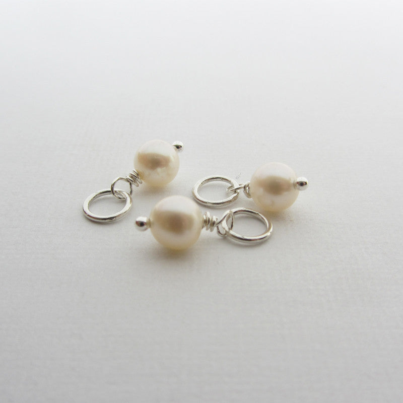 Three fresh water pearls 